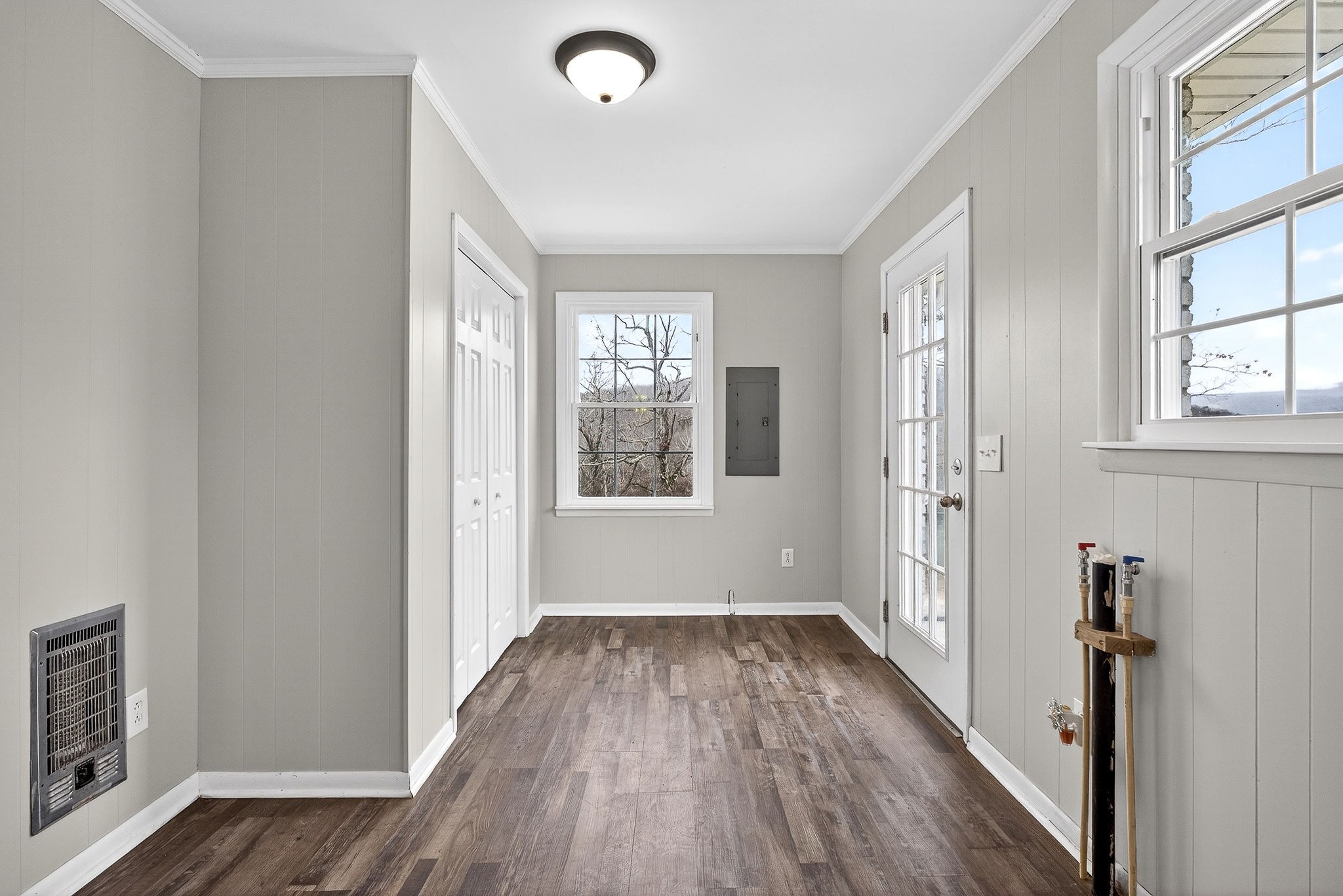 1528 Dry Creek Road McMinnville, TN 37110 - Photo 14 of 45 a view of an empty room with wooden floor and a window