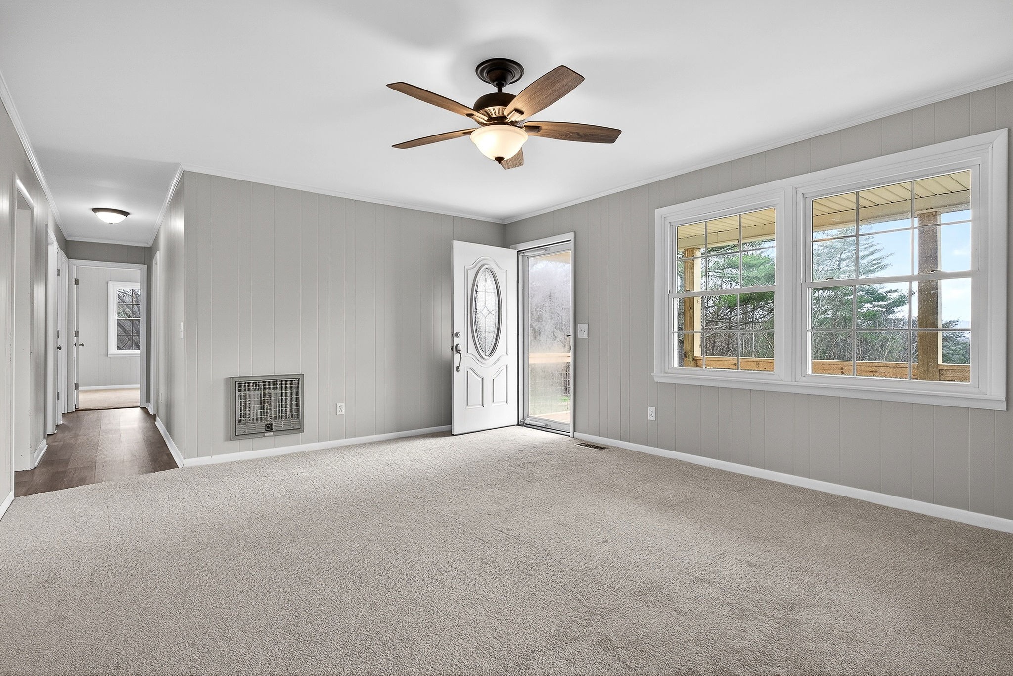1528 Dry Creek Road McMinnville, TN 37110 - Photo 23 of 45 a view of an empty room with window and a kitchen