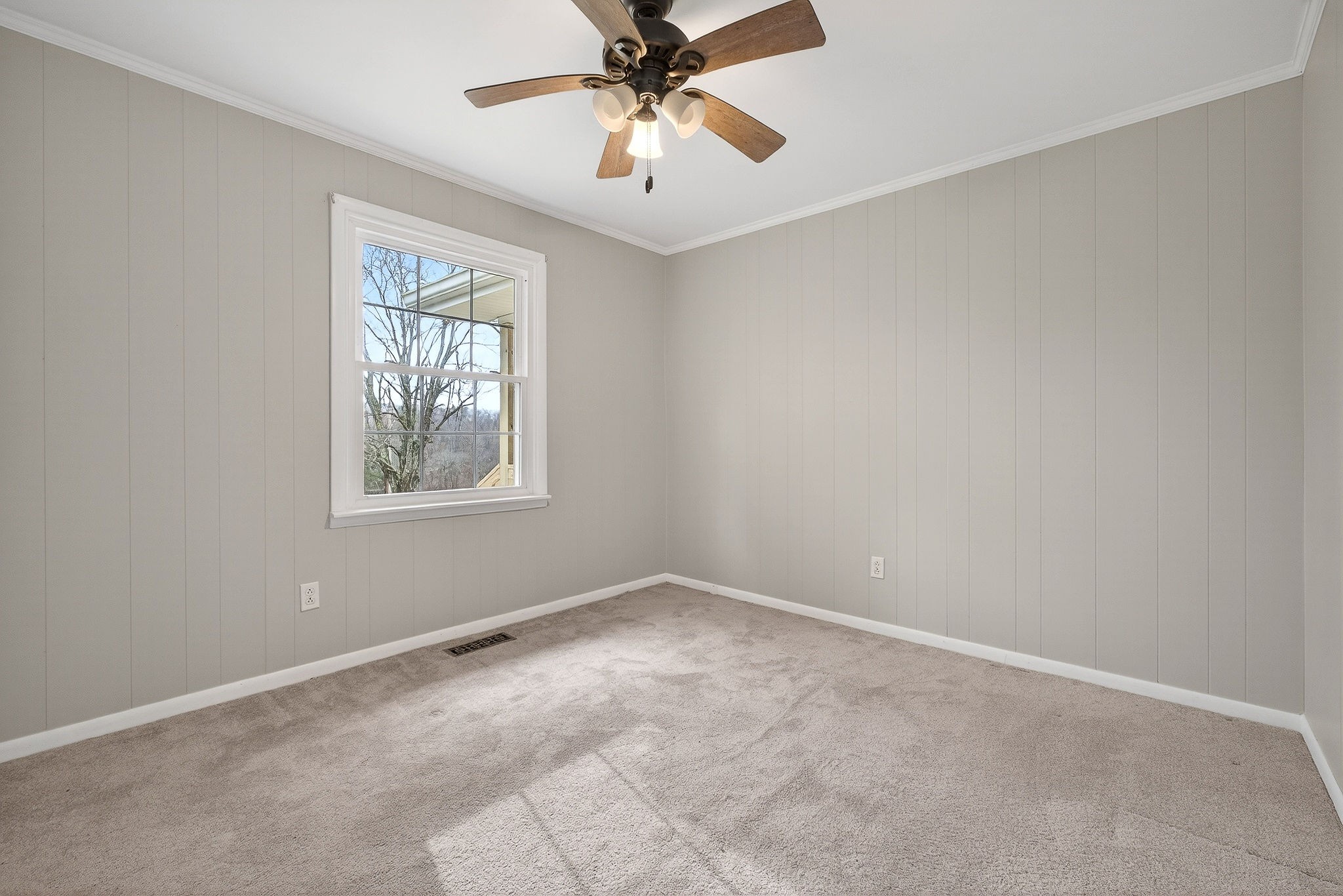 1528 Dry Creek Road McMinnville, TN 37110 - Photo 27 of 45 an empty room with windows and fan