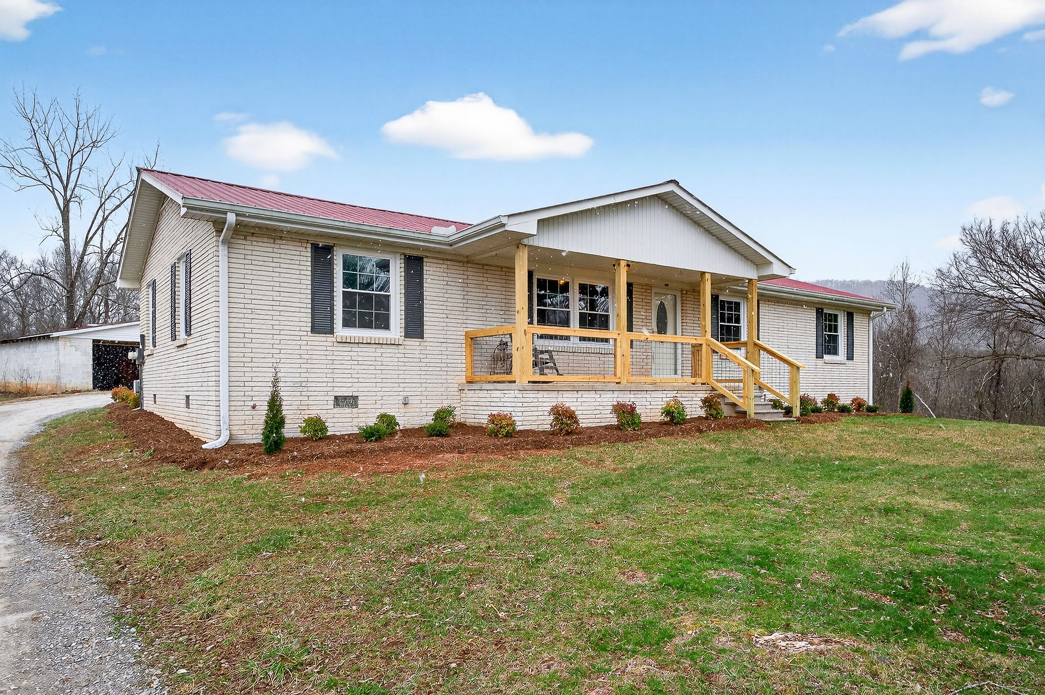 1528 Dry Creek Road McMinnville, TN 37110 - Photo 4 of 45 a front view of a house with a yard