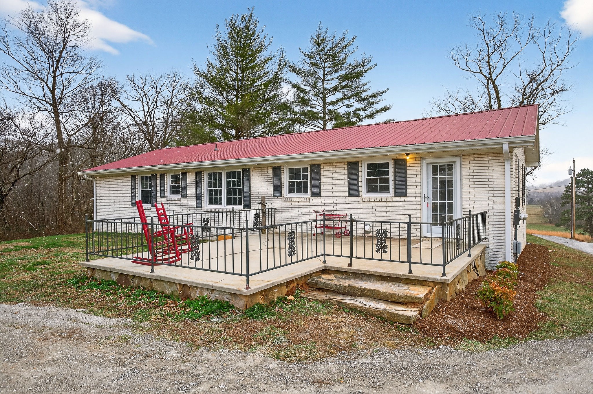 1528 Dry Creek Road McMinnville, TN 37110 - Photo 6 of 45 a view of a house with a yard and deck