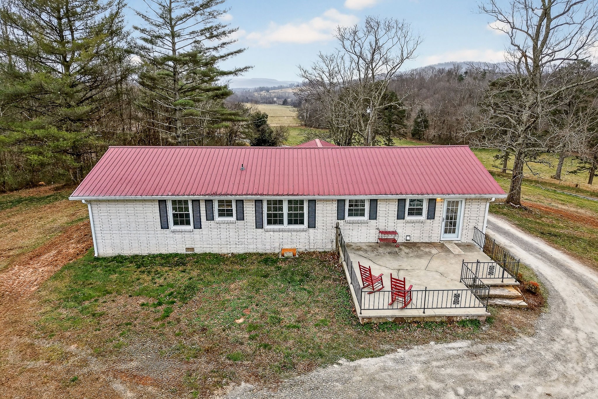 1528 Dry Creek Road McMinnville, TN 37110 - Photo 10 of 45 a view of a house with a yard and sitting area