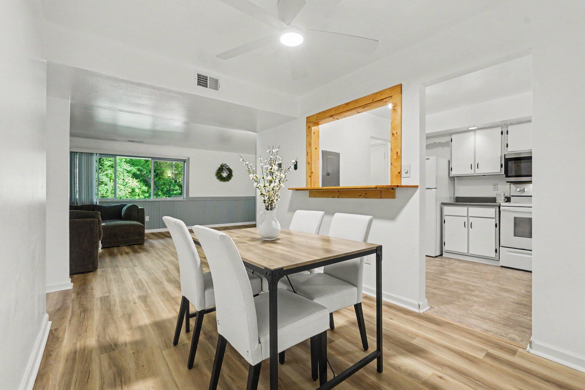 6712 Cascade Road Southeast, Unit 15 Grand Rapids, MI 49546 - Photo 8 of 17 Dining into LR and kitchen