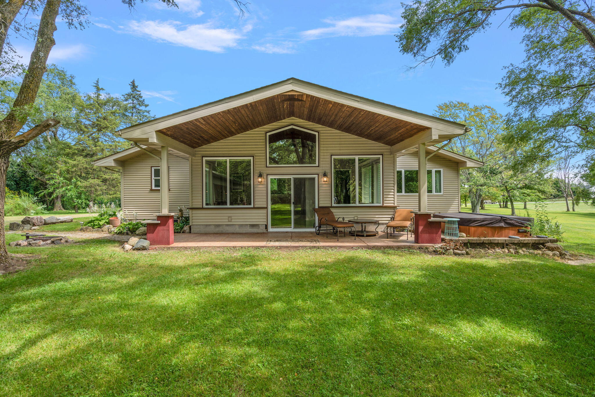 16280 Hendricks Street Lowell, IN 46356 - Photo 18 of 35 a view of a house with a big yard plants and large trees