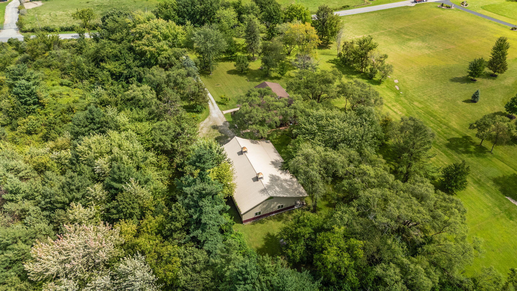 16280 Hendricks Street Lowell, IN 46356 - Photo 30 of 35 an aerial view of a house with a yard
