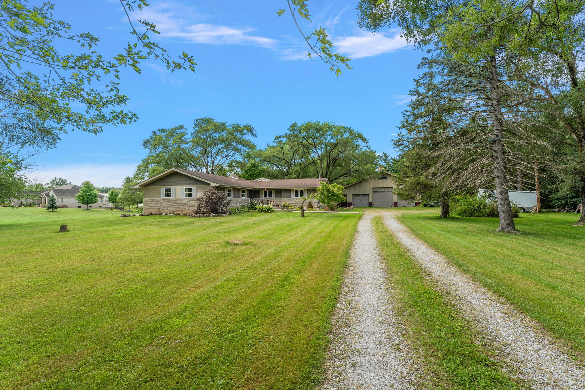 16280 Hendricks Street Lowell, IN 46356 - Photo 35 of 35 a view of an house with a garden
