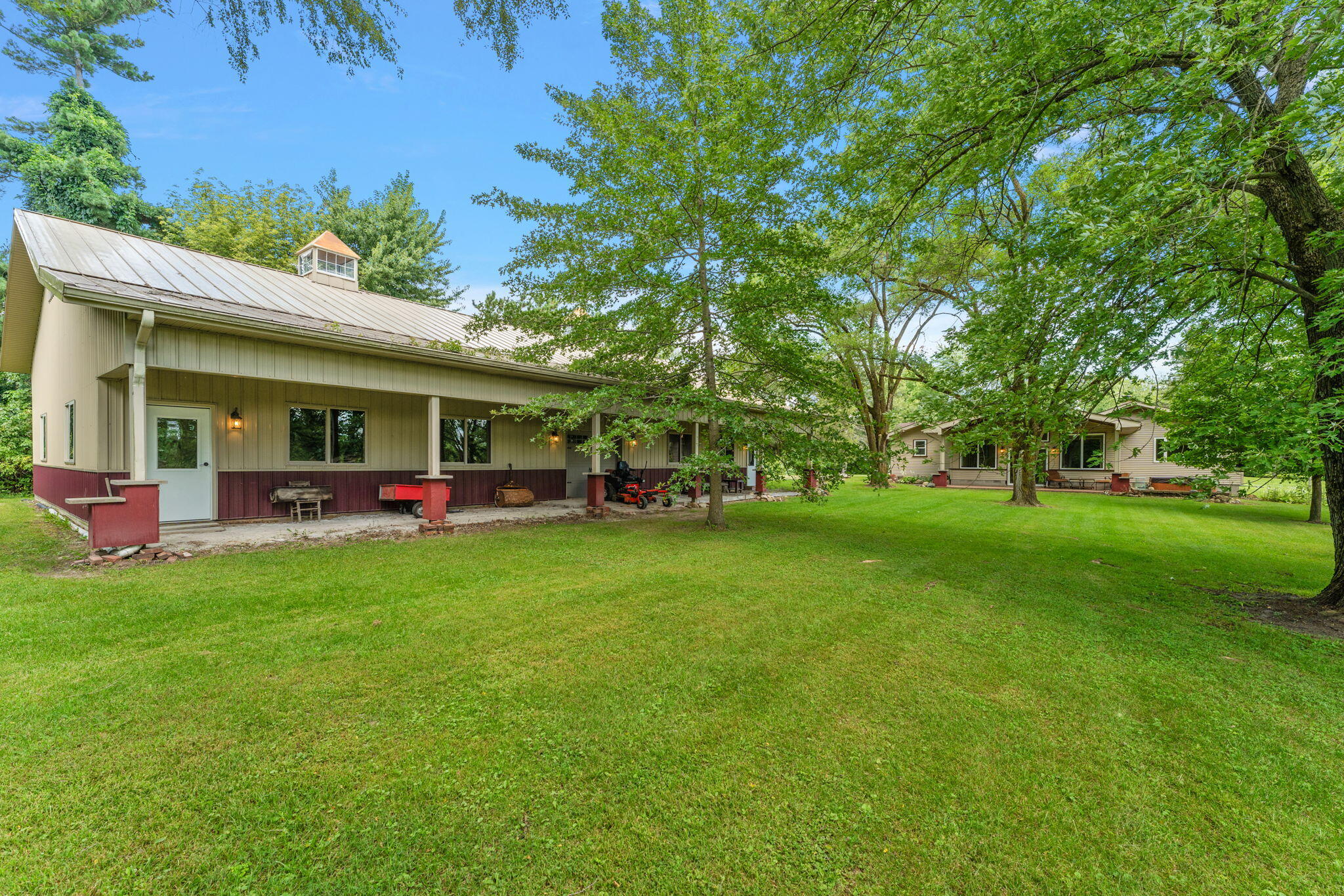 16280 Hendricks Street Lowell, IN 46356 - Photo 6 of 35 a front view of a house with garden