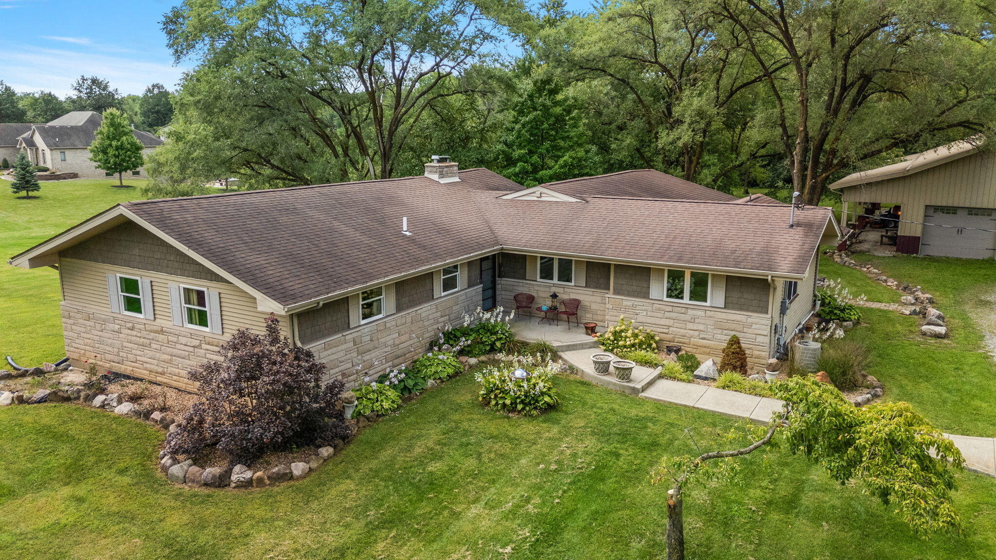 16280 Hendricks Street Lowell, IN 46356 - Photo 7 of 35 a aerial view of a house next to a yard