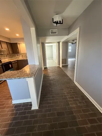 a view of livingroom with furniture and windows