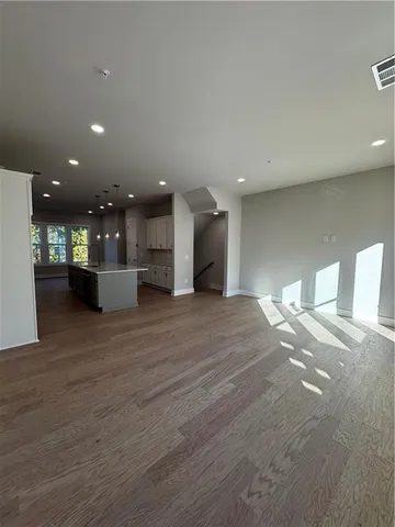 a view of a kitchen with a sink and a stove