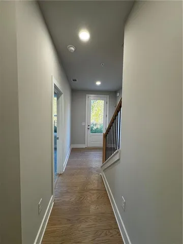 a view of hallway with windows