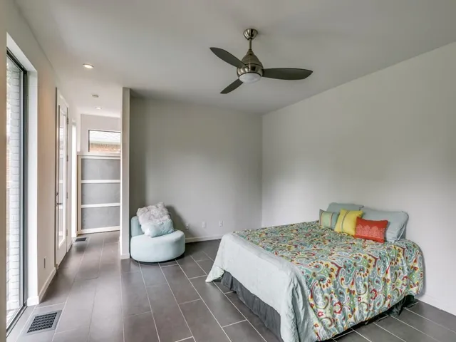 a kitchen with stainless steel appliances granite countertop a sink and a refrigerator