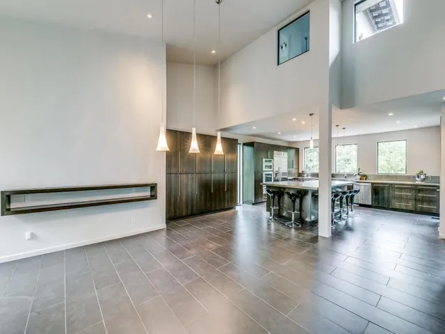 a lobby with furniture and wooden floor