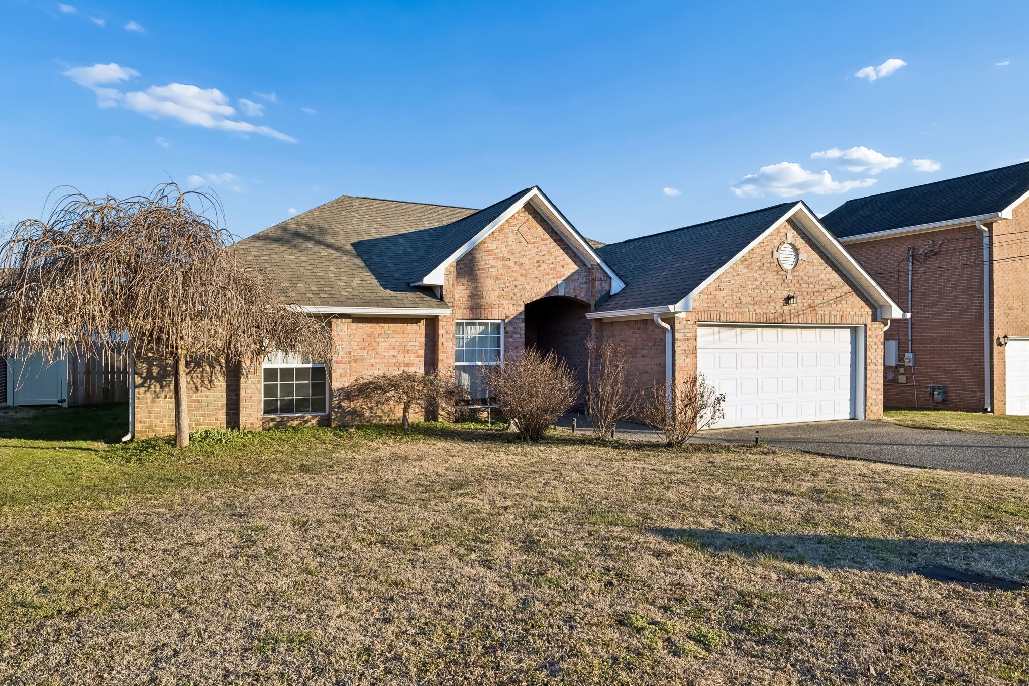 6112 Firelight Trail Antioch, TN 37013 - Photo 1 of 48 a front view of a house with a yard