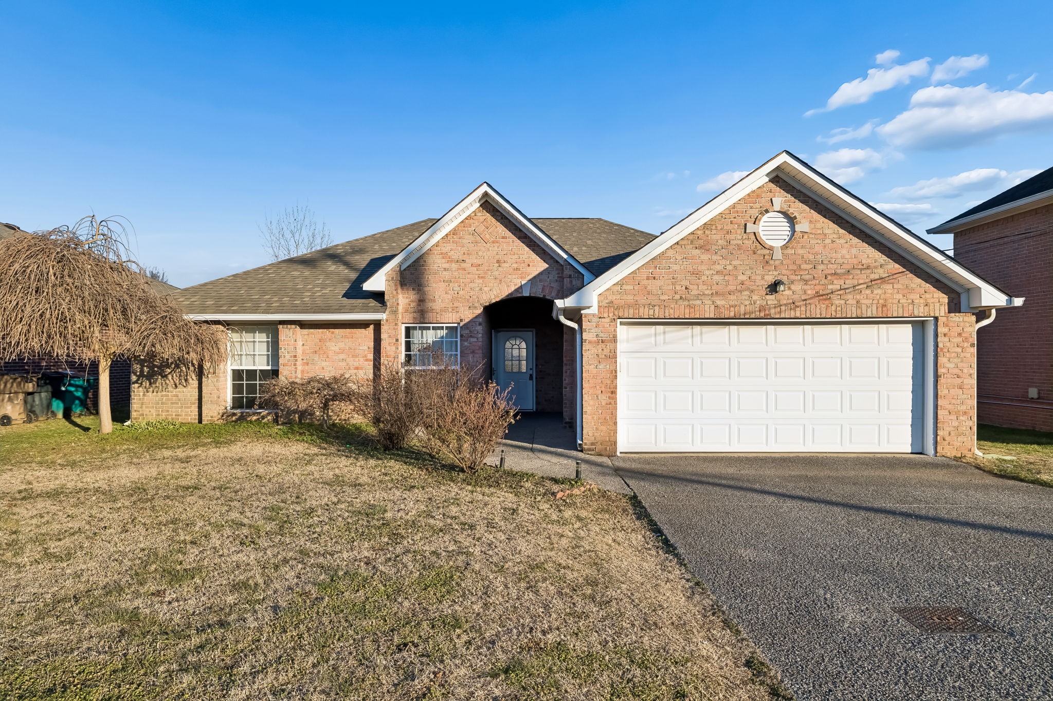6112 Firelight Trail Antioch, TN 37013 - Photo 2 of 48 a view of a house with a yard and garage