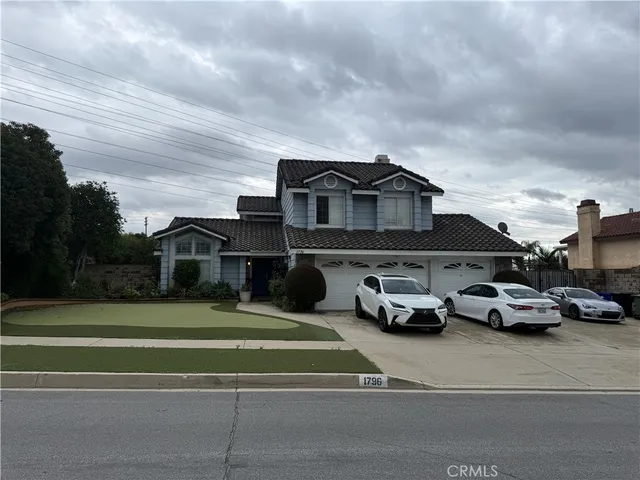 a car parked in front of a house