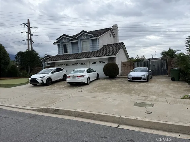 a car parked in front of a house