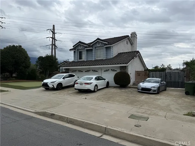 a car parked in front of a house