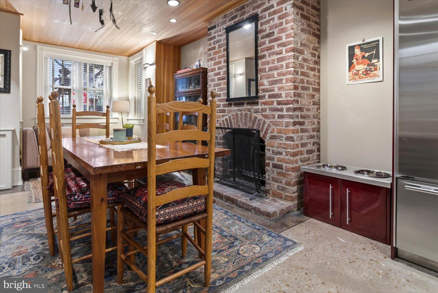 116 11th Street Northeast Washington, DC 20002 - Photo 15 of 40 Charming dining area with rustic brick accents.