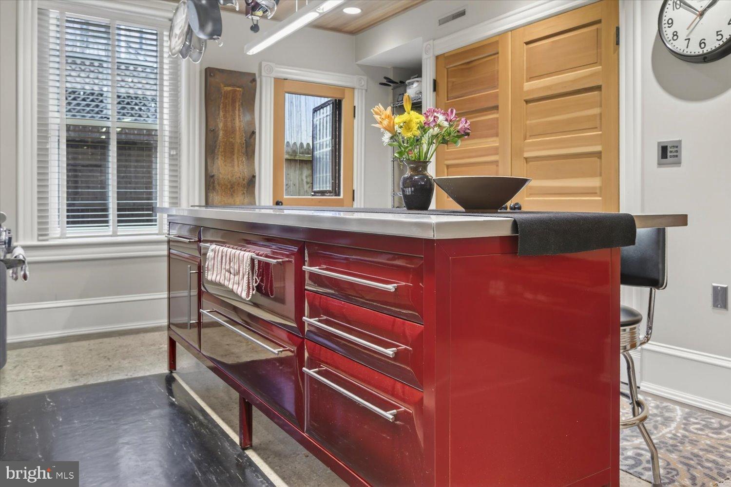 116 11th Street Northeast Washington, DC 20002 - Photo 18 of 40 Vibrant kitchen with sleek red island.