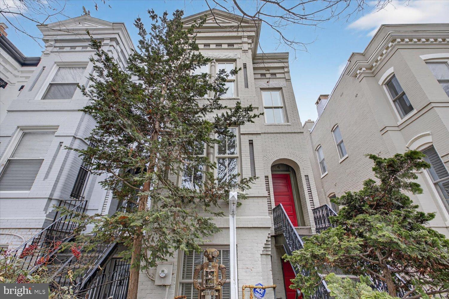 116 11th Street Northeast Washington, DC 20002 - Photo 2 of 40 Charming townhouse with vibrant red door.