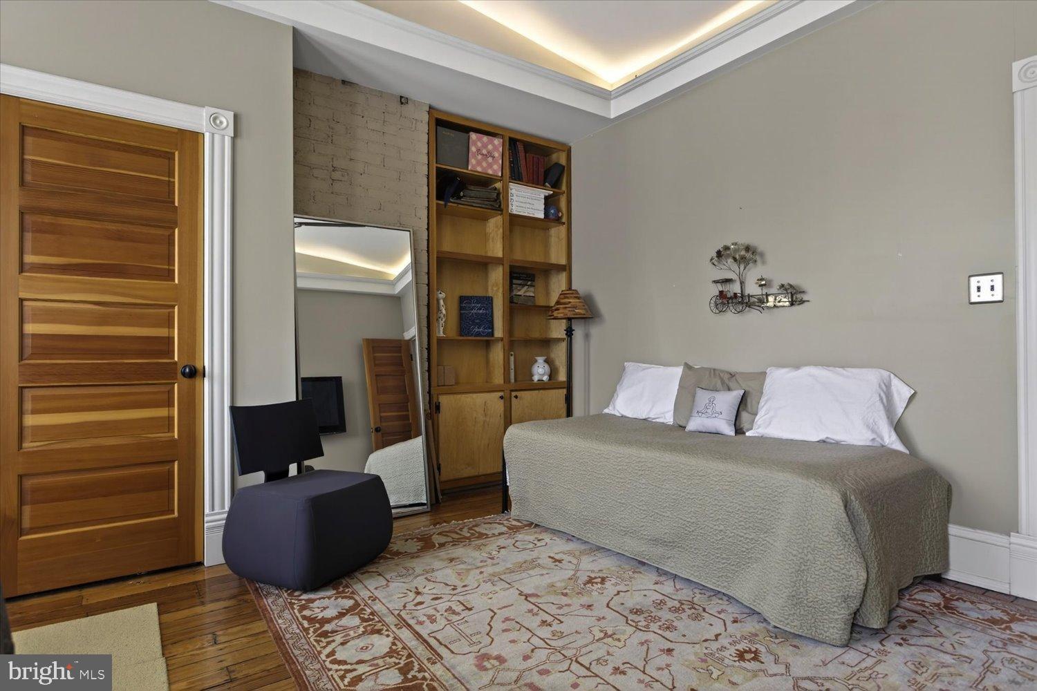 116 11th Street Northeast Washington, DC 20002 - Photo 29 of 40 Charming room with warm wooden accents.