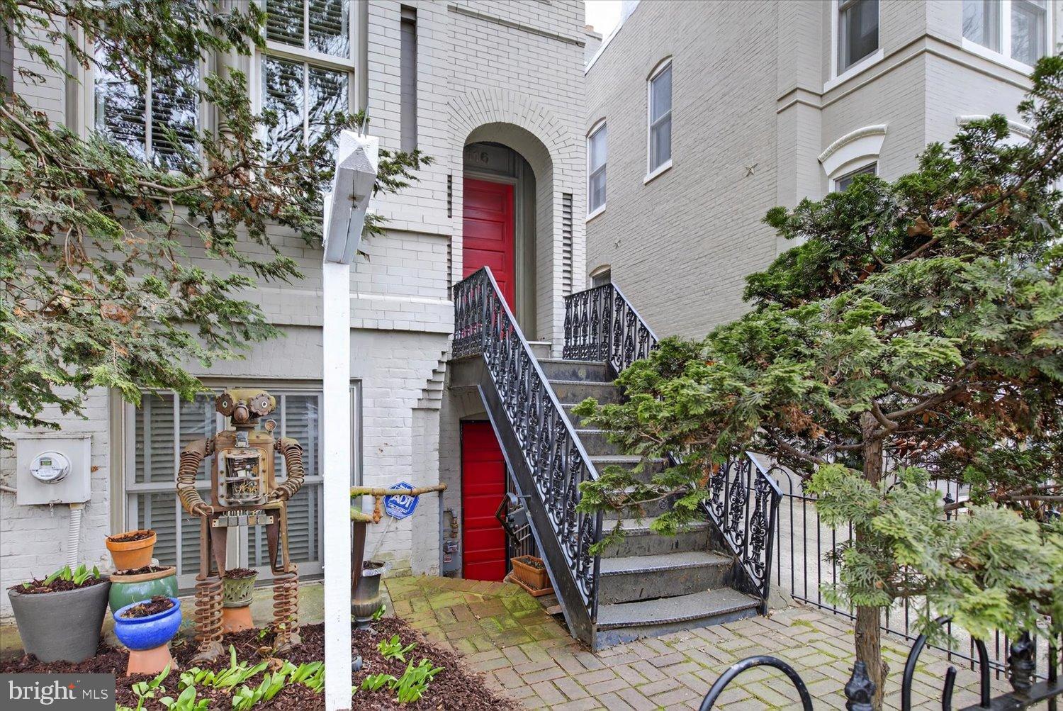 116 11th Street Northeast Washington, DC 20002 - Photo 3 of 40 Charming entrance with vibrant red door.