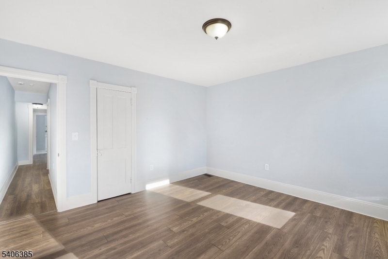 313 Mercer Street Phillipsburg, NJ 08865 - Photo 16 of 29 a view of a room with wooden floor