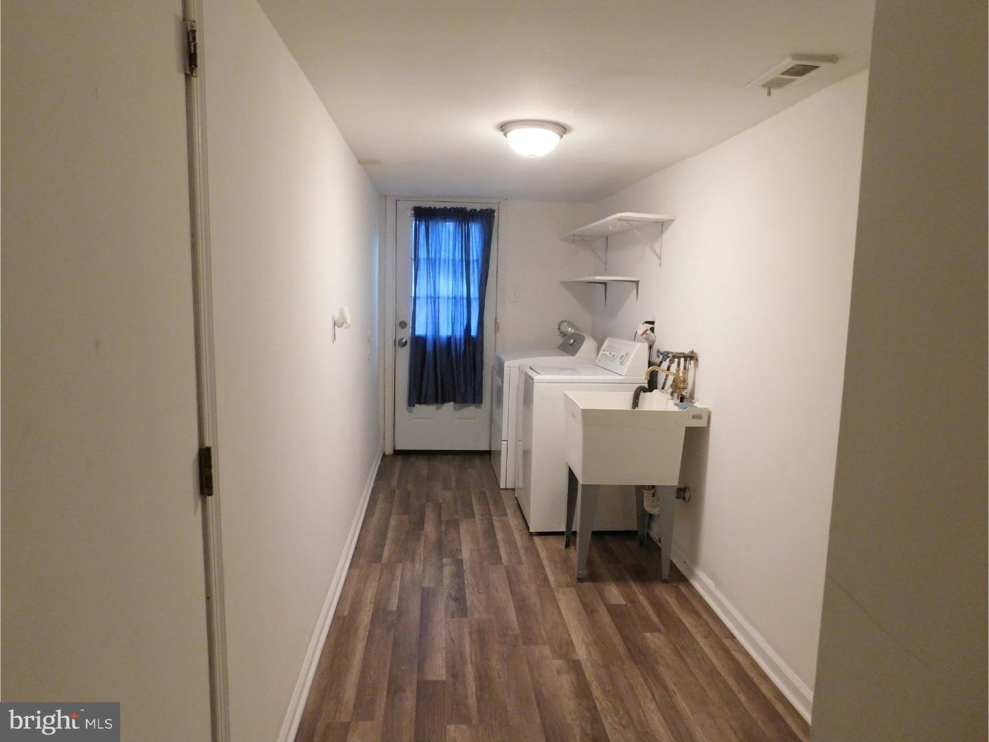 111 Sandringham Road Cherry Hill, NJ 08003 - Photo 22 of 39 FRESHLY PAINTED LAUNDRY ROOM WITH NEW FLOOR