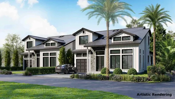 a front view of house and yard with green space