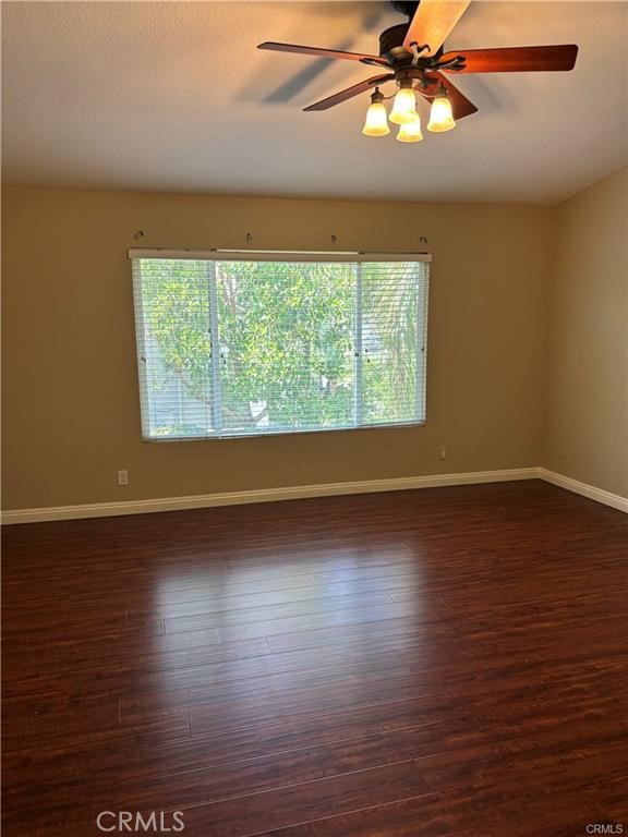 20 Berlamo Rancho Santa Margarita, CA 92688 - Photo 17 of 34 a view of a room with wooden floor and fan