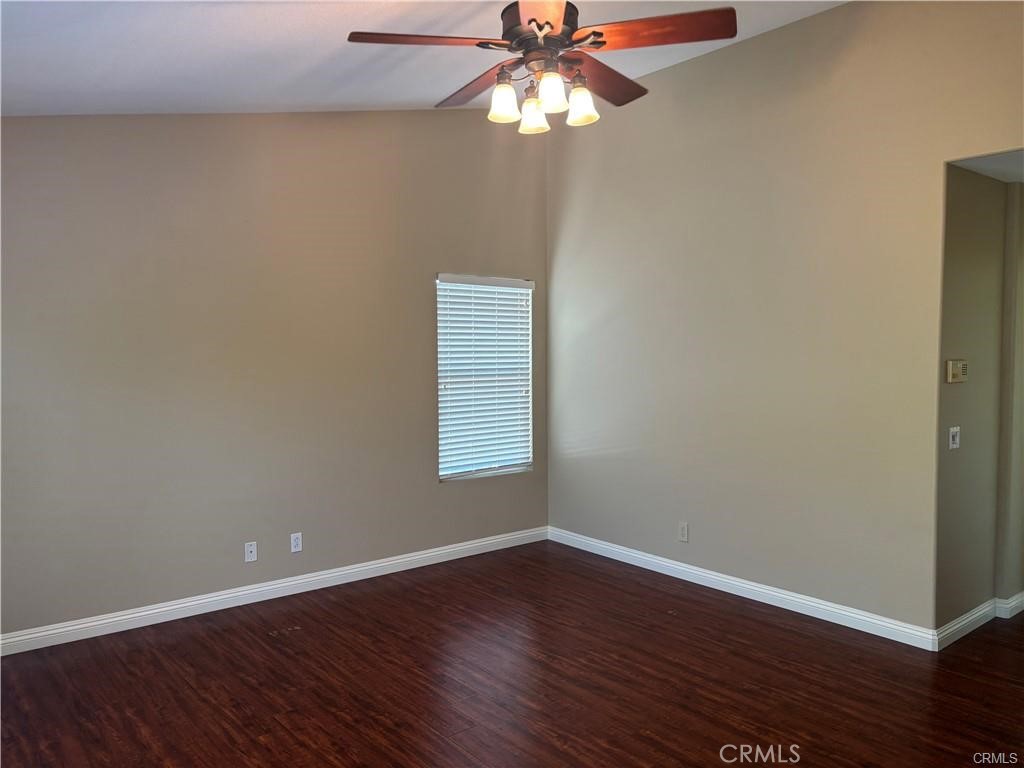 20 Berlamo Rancho Santa Margarita, CA 92688 - Photo 18 of 34 a view of an empty room with wooden floor and a window