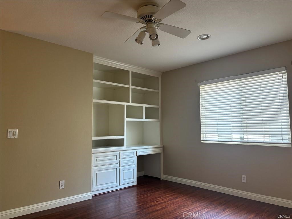 20 Berlamo Rancho Santa Margarita, CA 92688 - Photo 23 of 34 a view of an empty room with a window and wooden floor