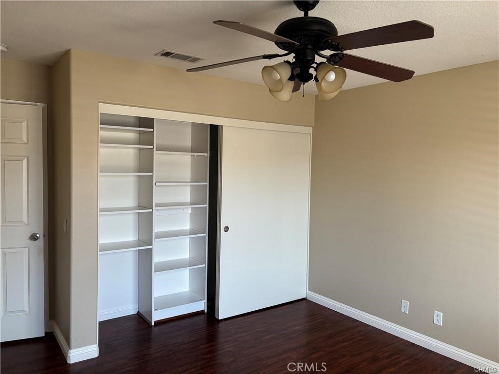 20 Berlamo Rancho Santa Margarita, CA 92688 - Photo 26 of 34 a view of an empty room with a window and wooden floor