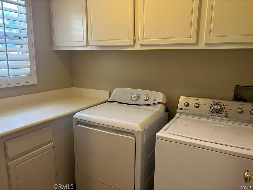 20 Berlamo Rancho Santa Margarita, CA 92688 - Photo 27 of 34 a utility room with dryer and washer