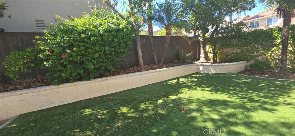 20 Berlamo Rancho Santa Margarita, CA 92688 - Photo 31 of 34 a view of a backyard with pathway