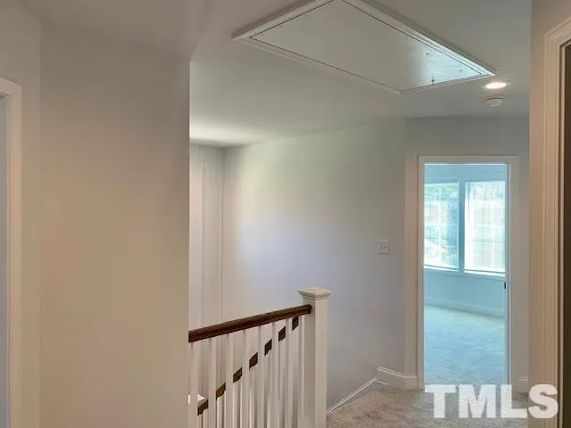 a view of a chandelier fan in a room