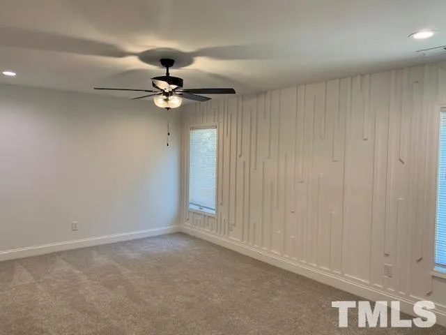 a bathroom with a double vanity sink mirror and