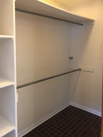 a view of small space with racks on the wall