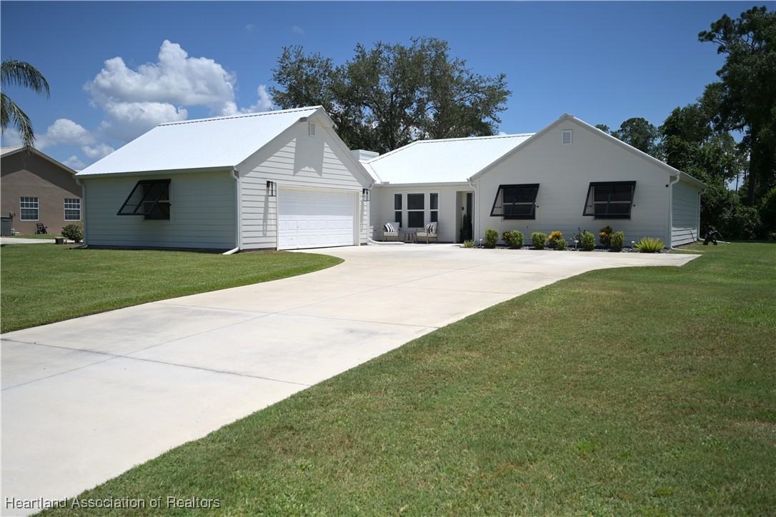 4626 Duffer Loop Sebring, FL 33872 - Photo 1 of 46 Front