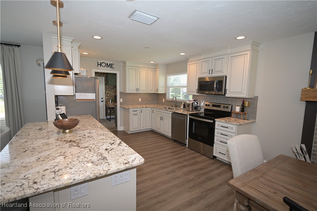4626 Duffer Loop Sebring, FL 33872 - Photo 12 of 46 Kitchen
