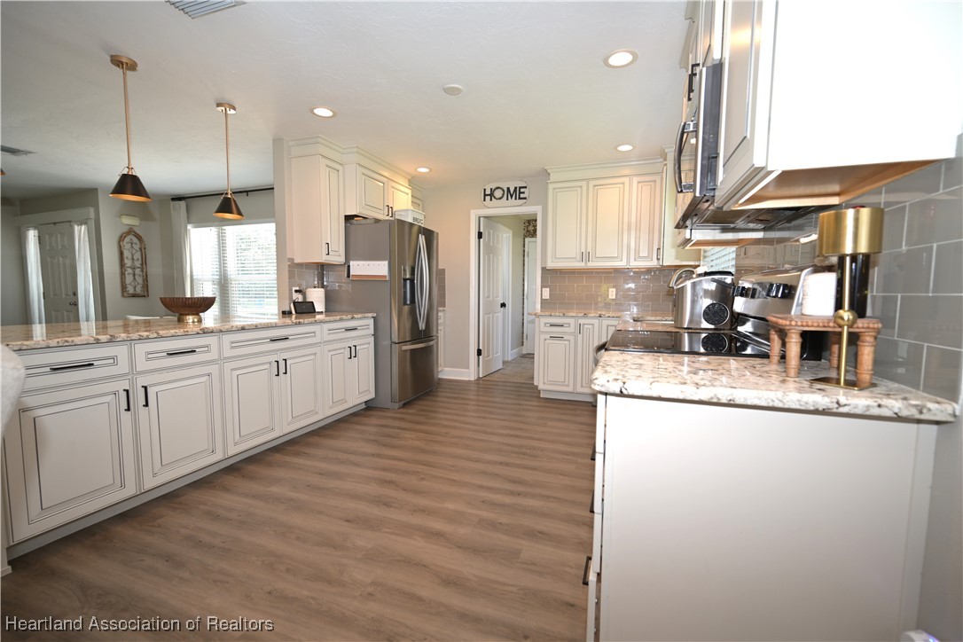 4626 Duffer Loop Sebring, FL 33872 - Photo 10 of 46 Kitchen