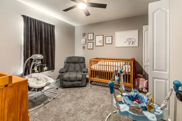 a bedroom with furniture and a couch