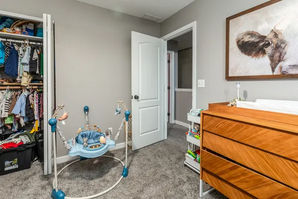 a room with a table and chairs