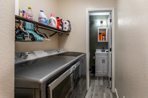 a utility room with dryer and washer