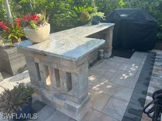 a vase of flowers sitting on a table