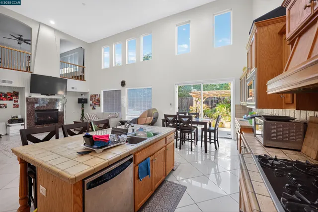 a bedroom with a bed and a ceiling fan