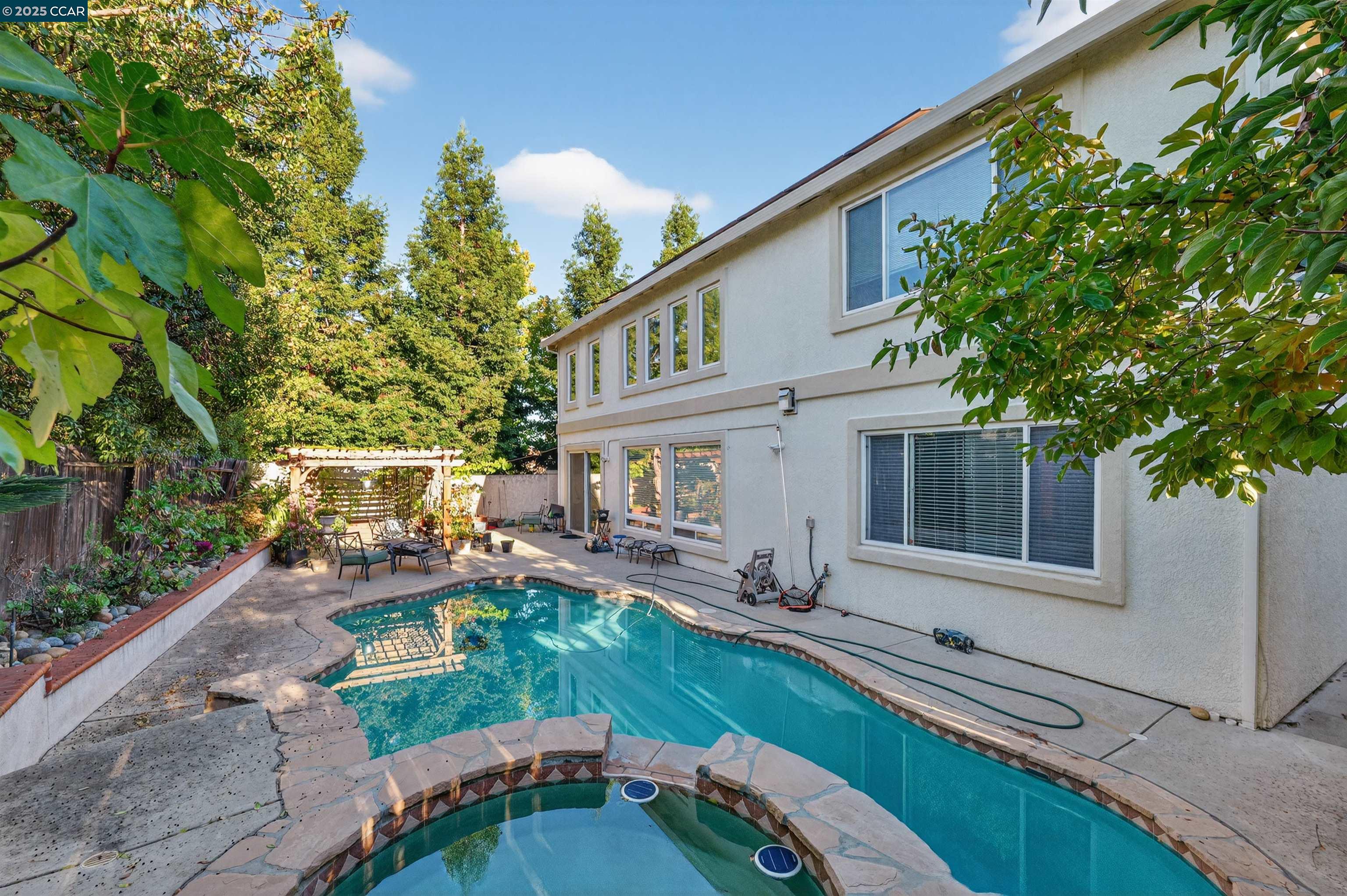 4100 Diorite Court Antioch, CA 94531 - Photo 31 of 35 a front view of a house with garden