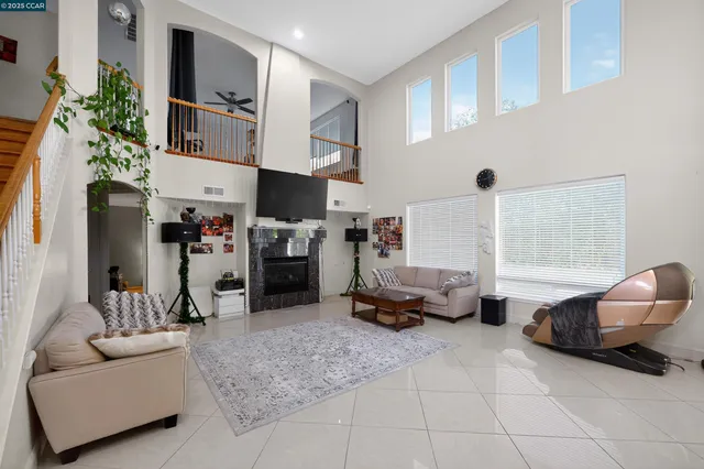 a living room with furniture and a couch