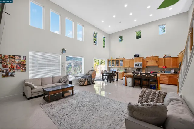 a view of a dining room with furniture and a window